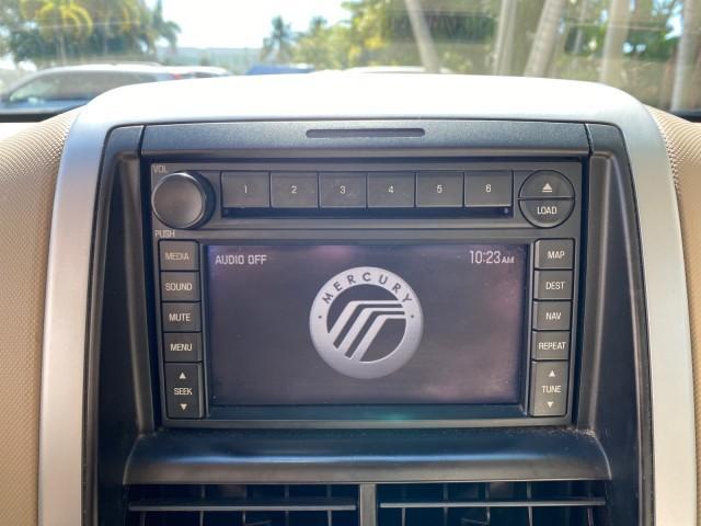 2007 Oxford White /Camel Mercury Mountaineer SUV Premier 1 OWNER (4M2EU38867U) with an 4.6L SOHC 24-Valve V8 Engine engine, Automatic transmission, located at 4701 North Dixie Hwy, Pompano Beach, FL, 33064, (954) 422-2889, 26.240938, -80.123474 - OUR WEBPAGE FLORIDACARS1.COM HAS OVER 100 PHOTOS AND FREE CARFAX LINK 2007 Mercury Mountaineer Premier 4 Door Wagon/Sport Utility 4.6L V8 F SOHC Gasoline 21 MPG Rear Wheel Drive Features ABS Brakes Air Conditioning Alloy Wheels AM/FM Stereo Audiophile Sound System Automatic Transmission Auxiliary Au- Photo#58