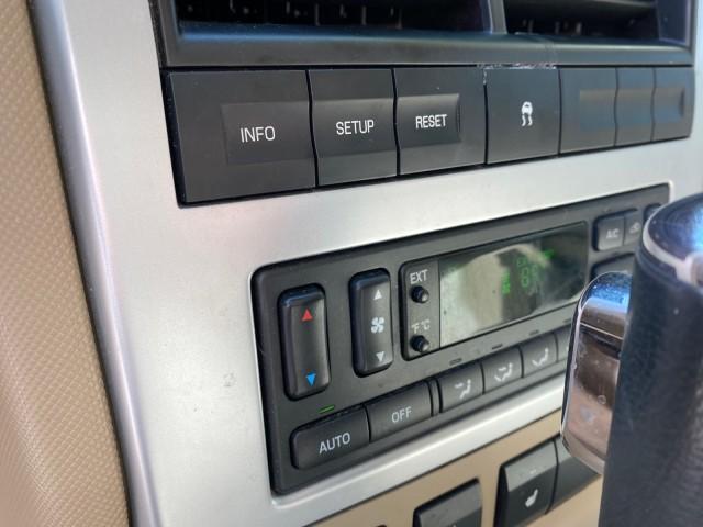 2007 Oxford White /Camel Mercury Mountaineer SUV Premier 1 OWNER (4M2EU38867U) with an 4.6L SOHC 24-Valve V8 Engine engine, Automatic transmission, located at 4701 North Dixie Hwy, Pompano Beach, FL, 33064, (954) 422-2889, 26.240938, -80.123474 - OUR WEBPAGE FLORIDACARS1.COM HAS OVER 100 PHOTOS AND FREE CARFAX LINK 2007 Mercury Mountaineer Premier 4 Door Wagon/Sport Utility 4.6L V8 F SOHC Gasoline 21 MPG Rear Wheel Drive Features ABS Brakes Air Conditioning Alloy Wheels AM/FM Stereo Audiophile Sound System Automatic Transmission Auxiliary Au- Photo#62
