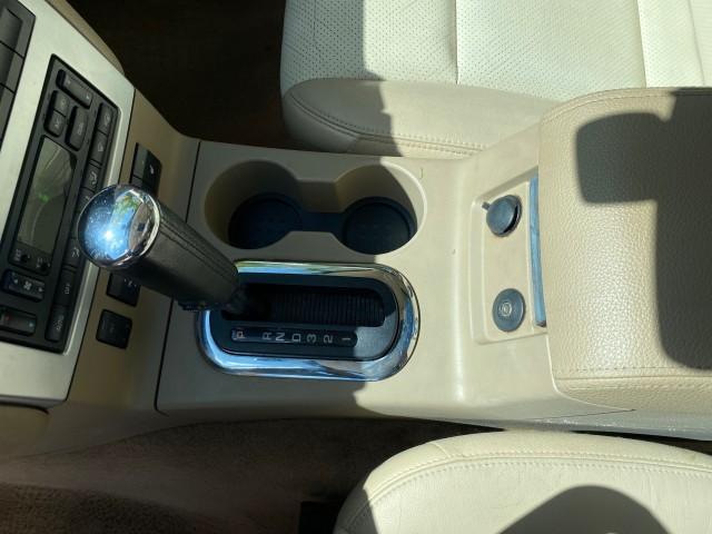 2007 Oxford White /Camel Mercury Mountaineer SUV Premier 1 OWNER (4M2EU38867U) with an 4.6L SOHC 24-Valve V8 Engine engine, Automatic transmission, located at 4701 North Dixie Hwy, Pompano Beach, FL, 33064, (954) 422-2889, 26.240938, -80.123474 - OUR WEBPAGE FLORIDACARS1.COM HAS OVER 100 PHOTOS AND FREE CARFAX LINK 2007 Mercury Mountaineer Premier 4 Door Wagon/Sport Utility 4.6L V8 F SOHC Gasoline 21 MPG Rear Wheel Drive Features ABS Brakes Air Conditioning Alloy Wheels AM/FM Stereo Audiophile Sound System Automatic Transmission Auxiliary Au- Photo#63