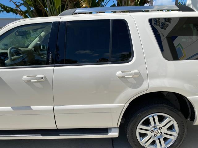 2007 Oxford White /Camel Mercury Mountaineer SUV Premier 1 OWNER (4M2EU38867U) with an 4.6L SOHC 24-Valve V8 Engine engine, Automatic transmission, located at 4701 North Dixie Hwy, Pompano Beach, FL, 33064, (954) 422-2889, 26.240938, -80.123474 - OUR WEBPAGE FLORIDACARS1.COM HAS OVER 100 PHOTOS AND FREE CARFAX LINK 2007 Mercury Mountaineer Premier 4 Door Wagon/Sport Utility 4.6L V8 F SOHC Gasoline 21 MPG Rear Wheel Drive Features ABS Brakes Air Conditioning Alloy Wheels AM/FM Stereo Audiophile Sound System Automatic Transmission Auxiliary Au- Photo#76