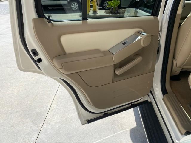 2007 Oxford White /Camel Mercury Mountaineer SUV Premier 1 OWNER (4M2EU38867U) with an 4.6L SOHC 24-Valve V8 Engine engine, Automatic transmission, located at 4701 North Dixie Hwy, Pompano Beach, FL, 33064, (954) 422-2889, 26.240938, -80.123474 - OUR WEBPAGE FLORIDACARS1.COM HAS OVER 100 PHOTOS AND FREE CARFAX LINK 2007 Mercury Mountaineer Premier 4 Door Wagon/Sport Utility 4.6L V8 F SOHC Gasoline 21 MPG Rear Wheel Drive Features ABS Brakes Air Conditioning Alloy Wheels AM/FM Stereo Audiophile Sound System Automatic Transmission Auxiliary Au- Photo#78