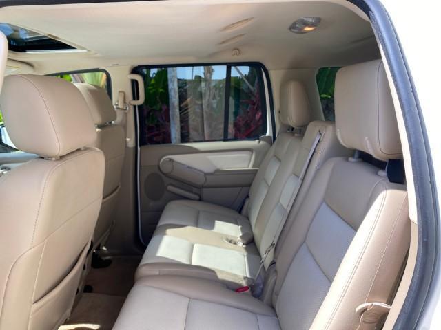 2007 Oxford White /Camel Mercury Mountaineer SUV Premier 1 OWNER (4M2EU38867U) with an 4.6L SOHC 24-Valve V8 Engine engine, Automatic transmission, located at 4701 North Dixie Hwy, Pompano Beach, FL, 33064, (954) 422-2889, 26.240938, -80.123474 - OUR WEBPAGE FLORIDACARS1.COM HAS OVER 100 PHOTOS AND FREE CARFAX LINK 2007 Mercury Mountaineer Premier 4 Door Wagon/Sport Utility 4.6L V8 F SOHC Gasoline 21 MPG Rear Wheel Drive Features ABS Brakes Air Conditioning Alloy Wheels AM/FM Stereo Audiophile Sound System Automatic Transmission Auxiliary Au- Photo#80