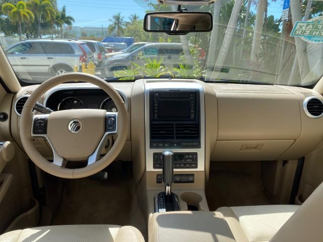 2007 Oxford White /Camel Mercury Mountaineer SUV Premier 1 OWNER (4M2EU38867U) with an 4.6L SOHC 24-Valve V8 Engine engine, Automatic transmission, located at 4701 North Dixie Hwy, Pompano Beach, FL, 33064, (954) 422-2889, 26.240938, -80.123474 - OUR WEBPAGE FLORIDACARS1.COM HAS OVER 100 PHOTOS AND FREE CARFAX LINK 2007 Mercury Mountaineer Premier 4 Door Wagon/Sport Utility 4.6L V8 F SOHC Gasoline 21 MPG Rear Wheel Drive Features ABS Brakes Air Conditioning Alloy Wheels AM/FM Stereo Audiophile Sound System Automatic Transmission Auxiliary Au- Photo#86