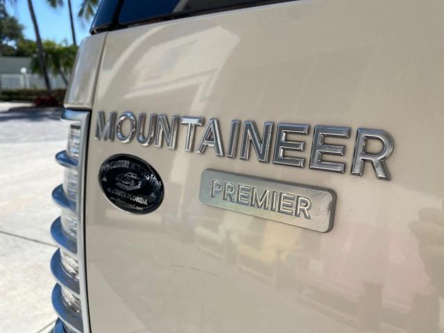 2007 Oxford White /Camel Mercury Mountaineer SUV Premier 1 OWNER (4M2EU38867U) with an 4.6L SOHC 24-Valve V8 Engine engine, Automatic transmission, located at 4701 North Dixie Hwy, Pompano Beach, FL, 33064, (954) 422-2889, 26.240938, -80.123474 - OUR WEBPAGE FLORIDACARS1.COM HAS OVER 100 PHOTOS AND FREE CARFAX LINK 2007 Mercury Mountaineer Premier 4 Door Wagon/Sport Utility 4.6L V8 F SOHC Gasoline 21 MPG Rear Wheel Drive Features ABS Brakes Air Conditioning Alloy Wheels AM/FM Stereo Audiophile Sound System Automatic Transmission Auxiliary Au- Photo#98