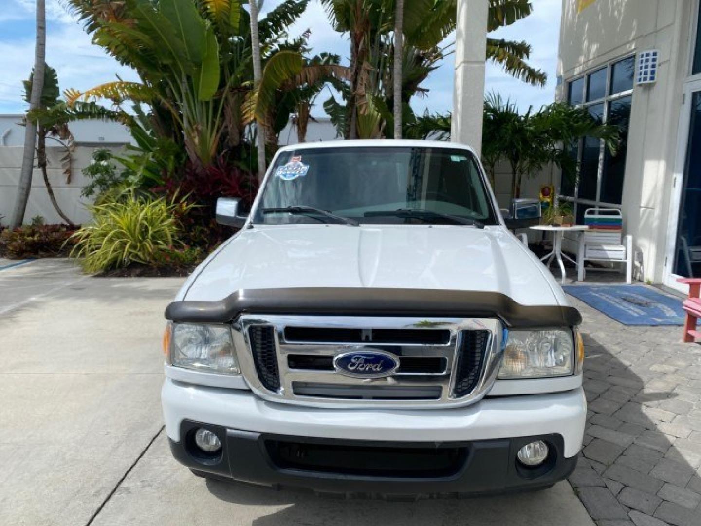 2011 Oxford White /Medium Dark Flint Ford Ranger X CAB XLT 1 OWNER FL (1FTKR1EE7BP) with an 4.0L SOHC V6 Engine engine, Automatic transmission, located at 4701 North Dixie Hwy, Pompano Beach, FL, 33064, (954) 422-2889, 26.240938, -80.123474 - OUR WEBPAGE FLORIDACARS1.COM HAS OVER 100 PHOTOS AND FREE CARFAX LINK 2011 Ford Ranger XLT 1 OWNER Club Cab Pickup 4.0L V6 F SOHC 16V Gasoline 21 MPG Rear Wheel Drive Features ABS Brakes Air Conditioning Alloy Wheels AM/FM Stereo Automatic Transmission Auxiliary Audio Input Bed Liner CD Audio Cloth- Photo#2