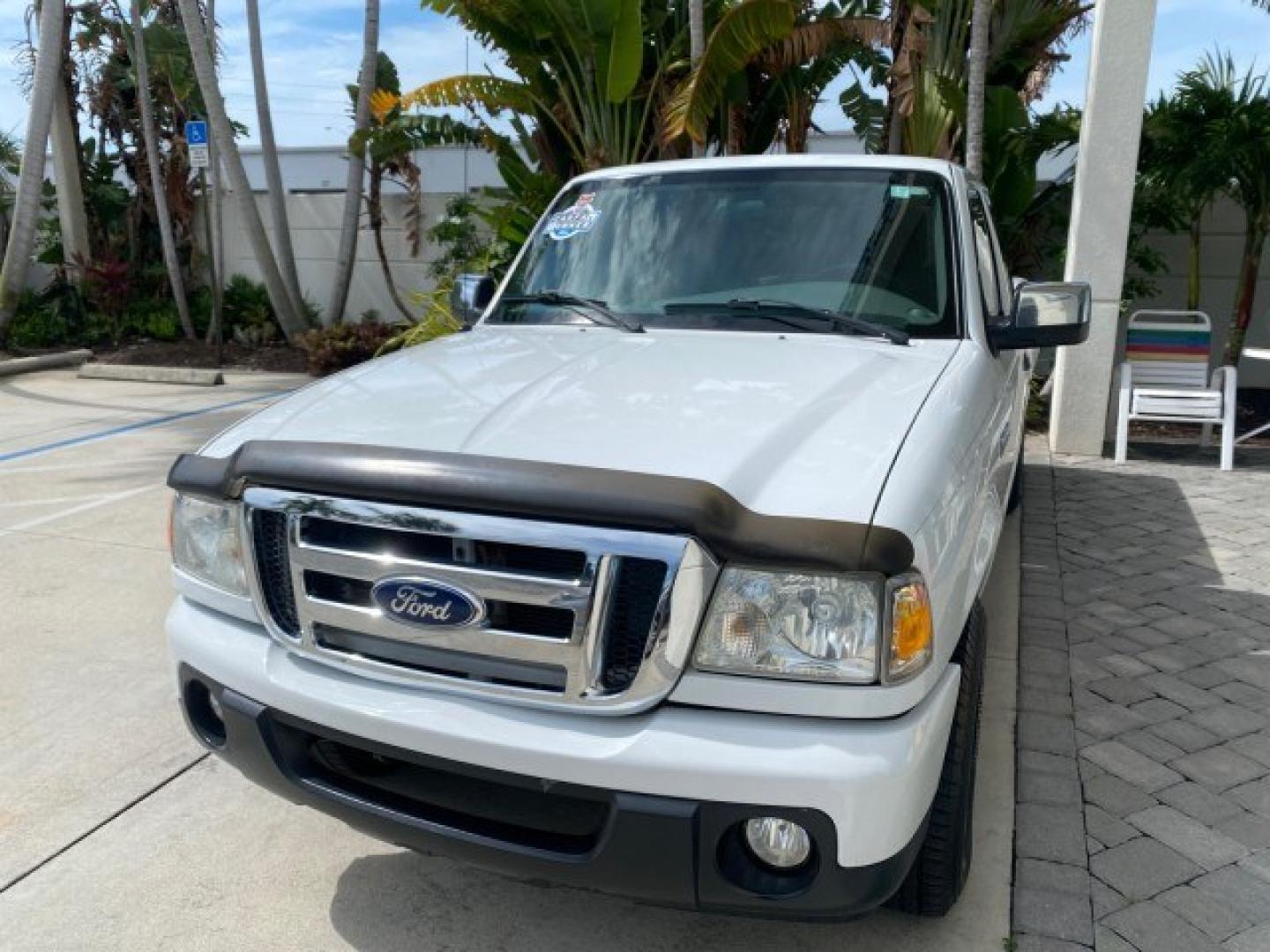 2011 Oxford White /Medium Dark Flint Ford Ranger X CAB XLT 1 OWNER FL (1FTKR1EE7BP) with an 4.0L SOHC V6 Engine engine, Automatic transmission, located at 4701 North Dixie Hwy, Pompano Beach, FL, 33064, (954) 422-2889, 26.240938, -80.123474 - OUR WEBPAGE FLORIDACARS1.COM HAS OVER 100 PHOTOS AND FREE CARFAX LINK 2011 Ford Ranger XLT 1 OWNER Club Cab Pickup 4.0L V6 F SOHC 16V Gasoline 21 MPG Rear Wheel Drive Features ABS Brakes Air Conditioning Alloy Wheels AM/FM Stereo Automatic Transmission Auxiliary Audio Input Bed Liner CD Audio Cloth- Photo#3