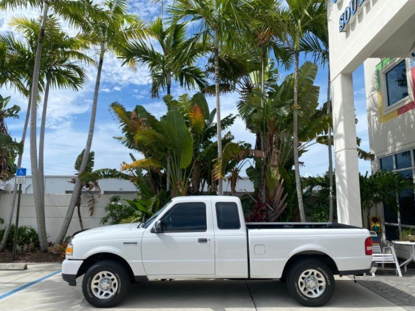 2011 Oxford White /Medium Dark Flint Ford Ranger X CAB XLT 1 OWNER FL (1FTKR1EE7BP) with an 4.0L SOHC V6 Engine engine, Automatic transmission, located at 4701 North Dixie Hwy, Pompano Beach, FL, 33064, (954) 422-2889, 26.240938, -80.123474 - OUR WEBPAGE FLORIDACARS1.COM HAS OVER 100 PHOTOS AND FREE CARFAX LINK 2011 Ford Ranger XLT 1 OWNER Club Cab Pickup 4.0L V6 F SOHC 16V Gasoline 21 MPG Rear Wheel Drive Features ABS Brakes Air Conditioning Alloy Wheels AM/FM Stereo Automatic Transmission Auxiliary Audio Input Bed Liner CD Audio Cloth- Photo#4