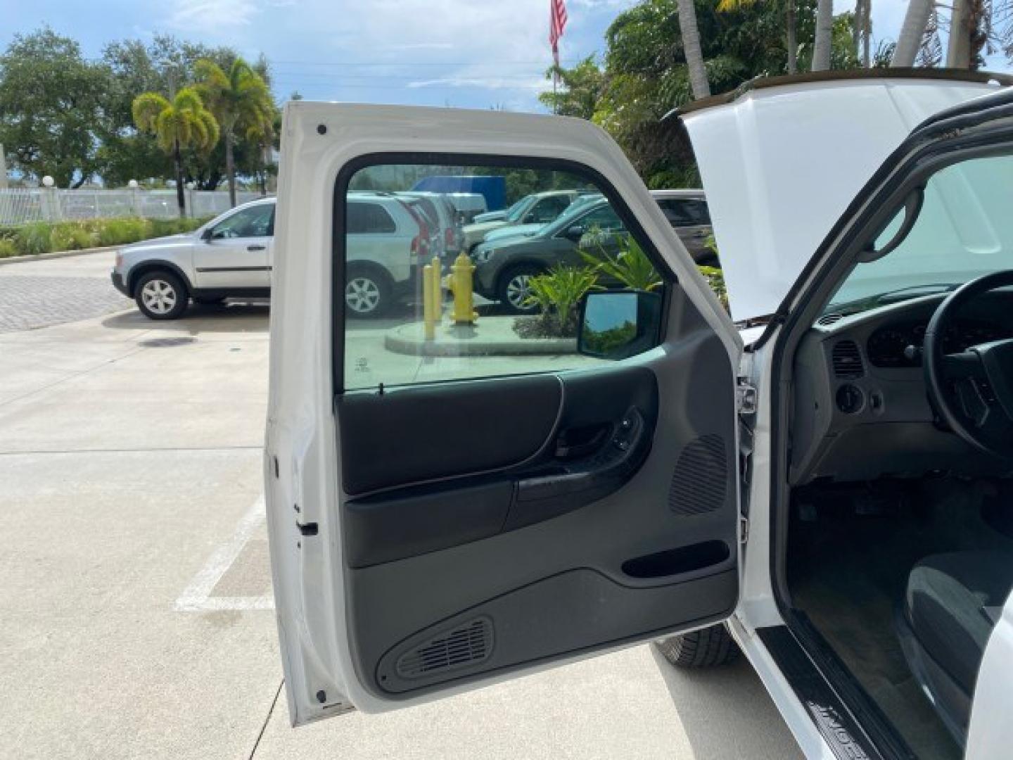2011 Oxford White /Medium Dark Flint Ford Ranger X CAB XLT 1 OWNER FL (1FTKR1EE7BP) with an 4.0L SOHC V6 Engine engine, Automatic transmission, located at 4701 North Dixie Hwy, Pompano Beach, FL, 33064, (954) 422-2889, 26.240938, -80.123474 - OUR WEBPAGE FLORIDACARS1.COM HAS OVER 100 PHOTOS AND FREE CARFAX LINK 2011 Ford Ranger XLT 1 OWNER Club Cab Pickup 4.0L V6 F SOHC 16V Gasoline 21 MPG Rear Wheel Drive Features ABS Brakes Air Conditioning Alloy Wheels AM/FM Stereo Automatic Transmission Auxiliary Audio Input Bed Liner CD Audio Cloth- Photo#9