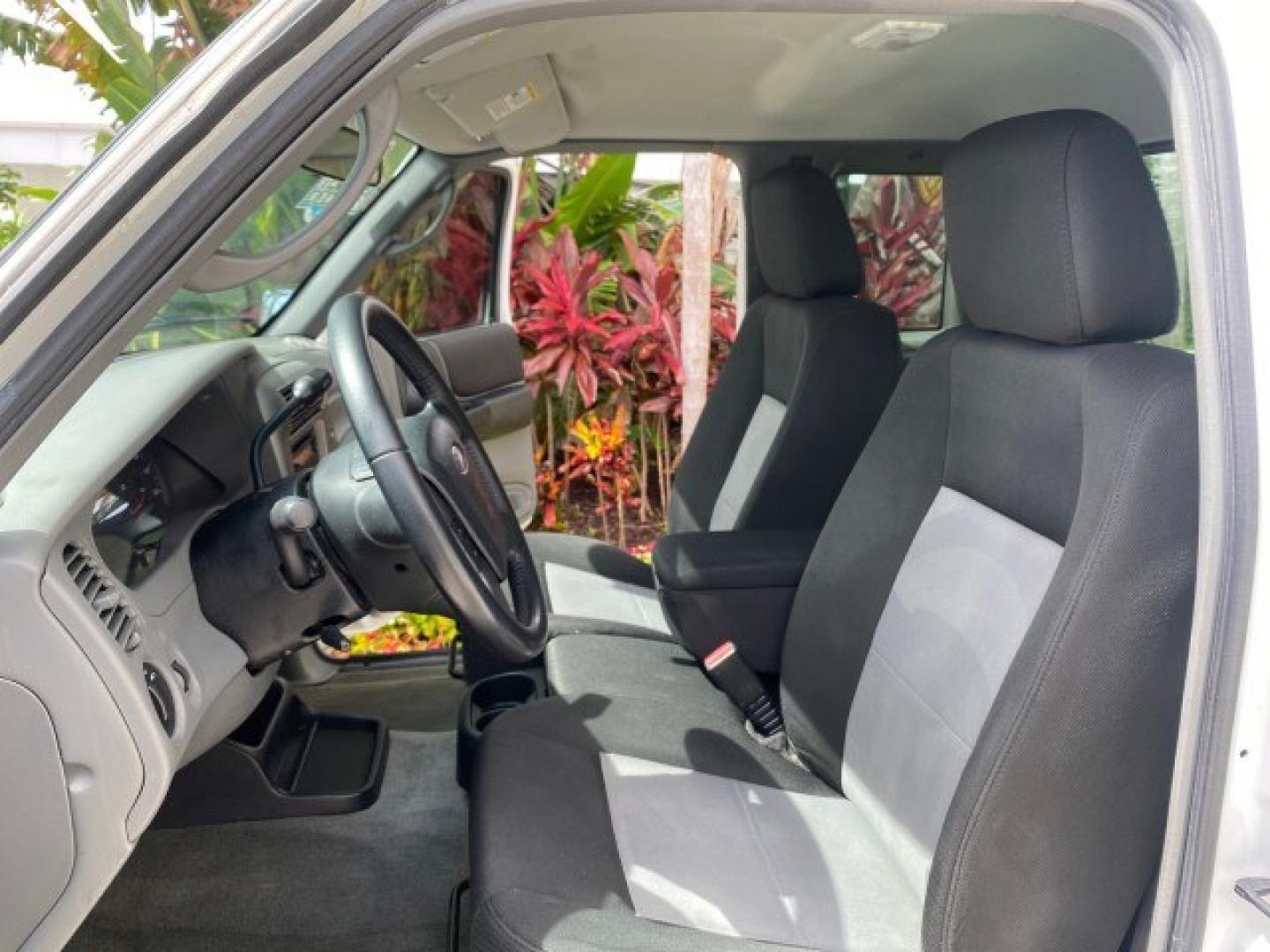 2011 Oxford White /Medium Dark Flint Ford Ranger X CAB XLT 1 OWNER FL (1FTKR1EE7BP) with an 4.0L SOHC V6 Engine engine, Automatic transmission, located at 4701 North Dixie Hwy, Pompano Beach, FL, 33064, (954) 422-2889, 26.240938, -80.123474 - OUR WEBPAGE FLORIDACARS1.COM HAS OVER 100 PHOTOS AND FREE CARFAX LINK 2011 Ford Ranger XLT 1 OWNER Club Cab Pickup 4.0L V6 F SOHC 16V Gasoline 21 MPG Rear Wheel Drive Features ABS Brakes Air Conditioning Alloy Wheels AM/FM Stereo Automatic Transmission Auxiliary Audio Input Bed Liner CD Audio Cloth- Photo#10