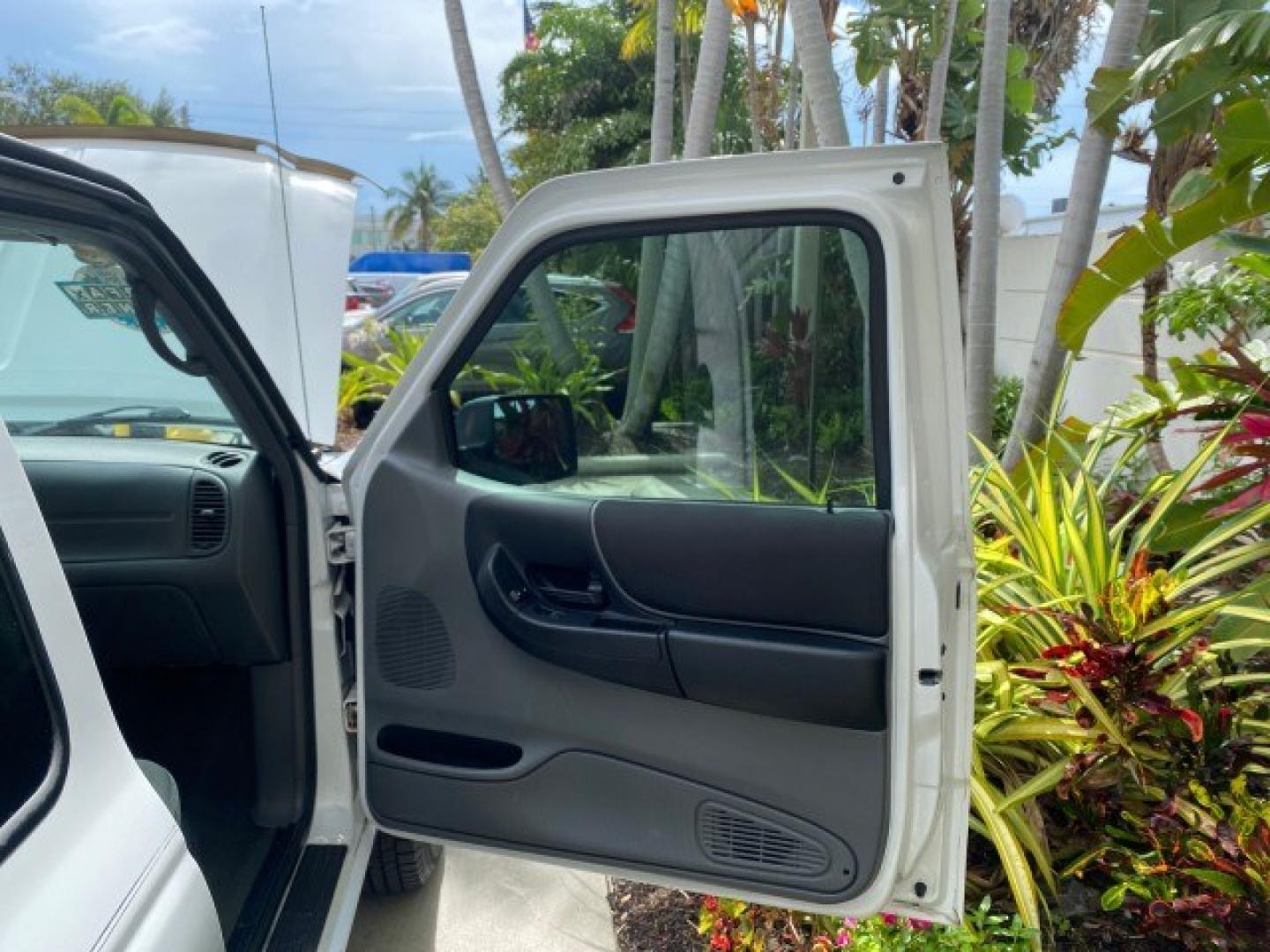 2011 Oxford White /Medium Dark Flint Ford Ranger X CAB XLT 1 OWNER FL (1FTKR1EE7BP) with an 4.0L SOHC V6 Engine engine, Automatic transmission, located at 4701 North Dixie Hwy, Pompano Beach, FL, 33064, (954) 422-2889, 26.240938, -80.123474 - OUR WEBPAGE FLORIDACARS1.COM HAS OVER 100 PHOTOS AND FREE CARFAX LINK 2011 Ford Ranger XLT 1 OWNER Club Cab Pickup 4.0L V6 F SOHC 16V Gasoline 21 MPG Rear Wheel Drive Features ABS Brakes Air Conditioning Alloy Wheels AM/FM Stereo Automatic Transmission Auxiliary Audio Input Bed Liner CD Audio Cloth- Photo#11