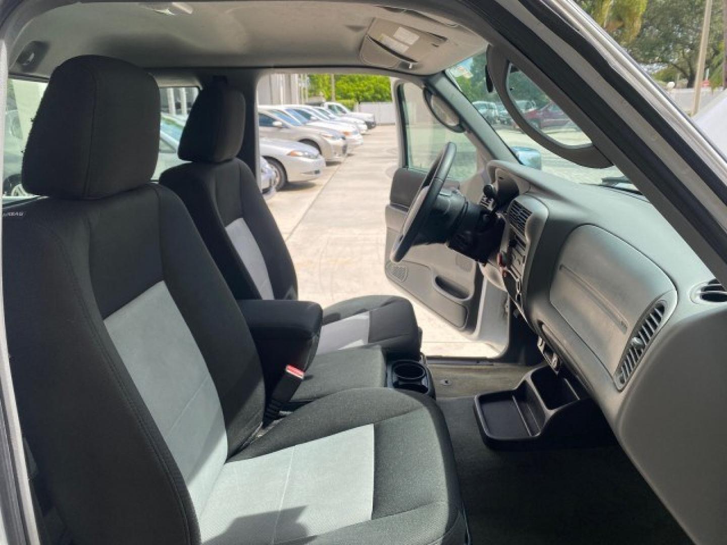 2011 Oxford White /Medium Dark Flint Ford Ranger X CAB XLT 1 OWNER FL (1FTKR1EE7BP) with an 4.0L SOHC V6 Engine engine, Automatic transmission, located at 4701 North Dixie Hwy, Pompano Beach, FL, 33064, (954) 422-2889, 26.240938, -80.123474 - OUR WEBPAGE FLORIDACARS1.COM HAS OVER 100 PHOTOS AND FREE CARFAX LINK 2011 Ford Ranger XLT 1 OWNER Club Cab Pickup 4.0L V6 F SOHC 16V Gasoline 21 MPG Rear Wheel Drive Features ABS Brakes Air Conditioning Alloy Wheels AM/FM Stereo Automatic Transmission Auxiliary Audio Input Bed Liner CD Audio Cloth- Photo#12
