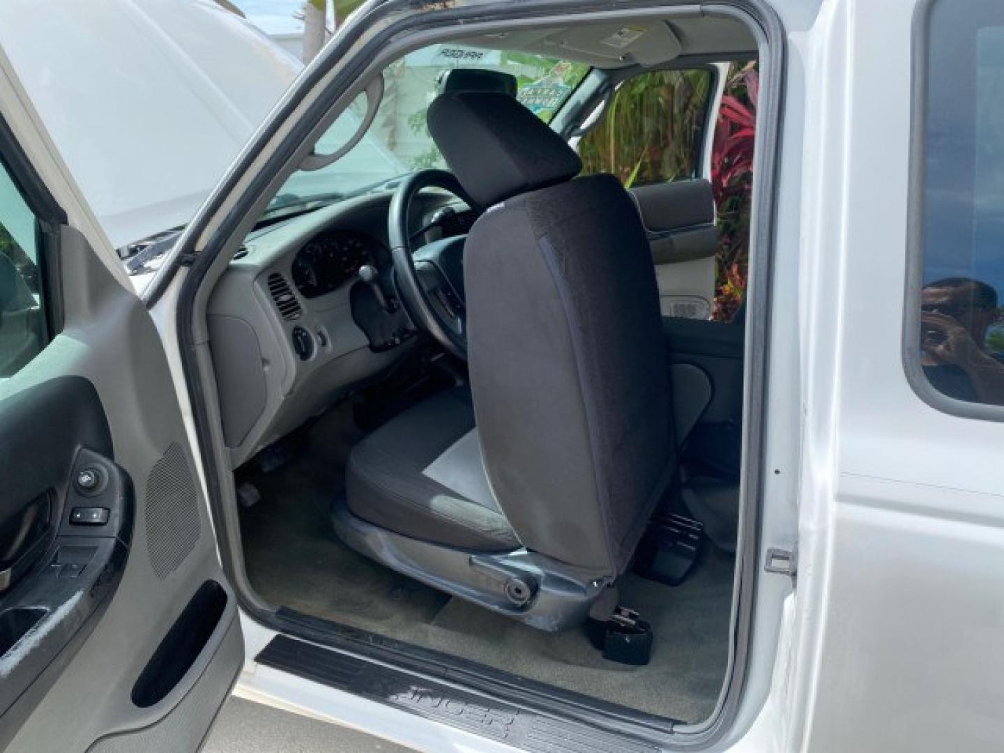 2011 Oxford White /Medium Dark Flint Ford Ranger X CAB XLT 1 OWNER FL (1FTKR1EE7BP) with an 4.0L SOHC V6 Engine engine, Automatic transmission, located at 4701 North Dixie Hwy, Pompano Beach, FL, 33064, (954) 422-2889, 26.240938, -80.123474 - OUR WEBPAGE FLORIDACARS1.COM HAS OVER 100 PHOTOS AND FREE CARFAX LINK 2011 Ford Ranger XLT 1 OWNER Club Cab Pickup 4.0L V6 F SOHC 16V Gasoline 21 MPG Rear Wheel Drive Features ABS Brakes Air Conditioning Alloy Wheels AM/FM Stereo Automatic Transmission Auxiliary Audio Input Bed Liner CD Audio Cloth- Photo#13