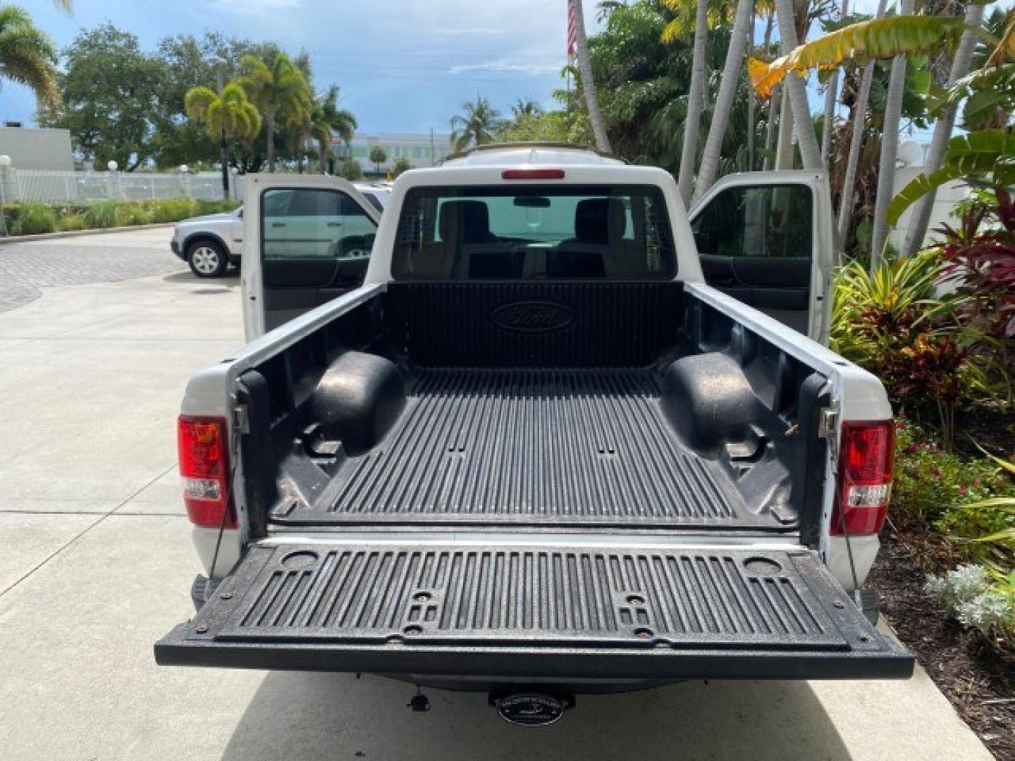 2011 Oxford White /Medium Dark Flint Ford Ranger X CAB XLT 1 OWNER FL (1FTKR1EE7BP) with an 4.0L SOHC V6 Engine engine, Automatic transmission, located at 4701 North Dixie Hwy, Pompano Beach, FL, 33064, (954) 422-2889, 26.240938, -80.123474 - OUR WEBPAGE FLORIDACARS1.COM HAS OVER 100 PHOTOS AND FREE CARFAX LINK 2011 Ford Ranger XLT 1 OWNER Club Cab Pickup 4.0L V6 F SOHC 16V Gasoline 21 MPG Rear Wheel Drive Features ABS Brakes Air Conditioning Alloy Wheels AM/FM Stereo Automatic Transmission Auxiliary Audio Input Bed Liner CD Audio Cloth- Photo#15