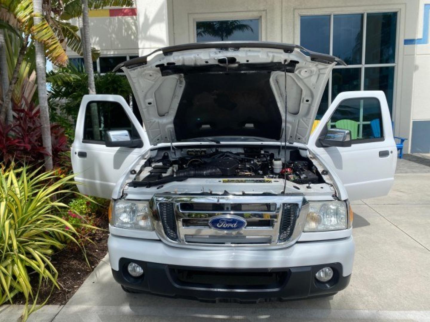 2011 Oxford White /Medium Dark Flint Ford Ranger X CAB XLT 1 OWNER FL (1FTKR1EE7BP) with an 4.0L SOHC V6 Engine engine, Automatic transmission, located at 4701 North Dixie Hwy, Pompano Beach, FL, 33064, (954) 422-2889, 26.240938, -80.123474 - OUR WEBPAGE FLORIDACARS1.COM HAS OVER 100 PHOTOS AND FREE CARFAX LINK 2011 Ford Ranger XLT 1 OWNER Club Cab Pickup 4.0L V6 F SOHC 16V Gasoline 21 MPG Rear Wheel Drive Features ABS Brakes Air Conditioning Alloy Wheels AM/FM Stereo Automatic Transmission Auxiliary Audio Input Bed Liner CD Audio Cloth- Photo#17