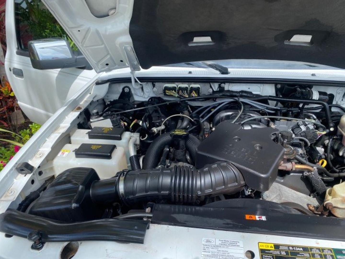 2011 Oxford White /Medium Dark Flint Ford Ranger X CAB XLT 1 OWNER FL (1FTKR1EE7BP) with an 4.0L SOHC V6 Engine engine, Automatic transmission, located at 4701 North Dixie Hwy, Pompano Beach, FL, 33064, (954) 422-2889, 26.240938, -80.123474 - OUR WEBPAGE FLORIDACARS1.COM HAS OVER 100 PHOTOS AND FREE CARFAX LINK 2011 Ford Ranger XLT 1 OWNER Club Cab Pickup 4.0L V6 F SOHC 16V Gasoline 21 MPG Rear Wheel Drive Features ABS Brakes Air Conditioning Alloy Wheels AM/FM Stereo Automatic Transmission Auxiliary Audio Input Bed Liner CD Audio Cloth- Photo#24