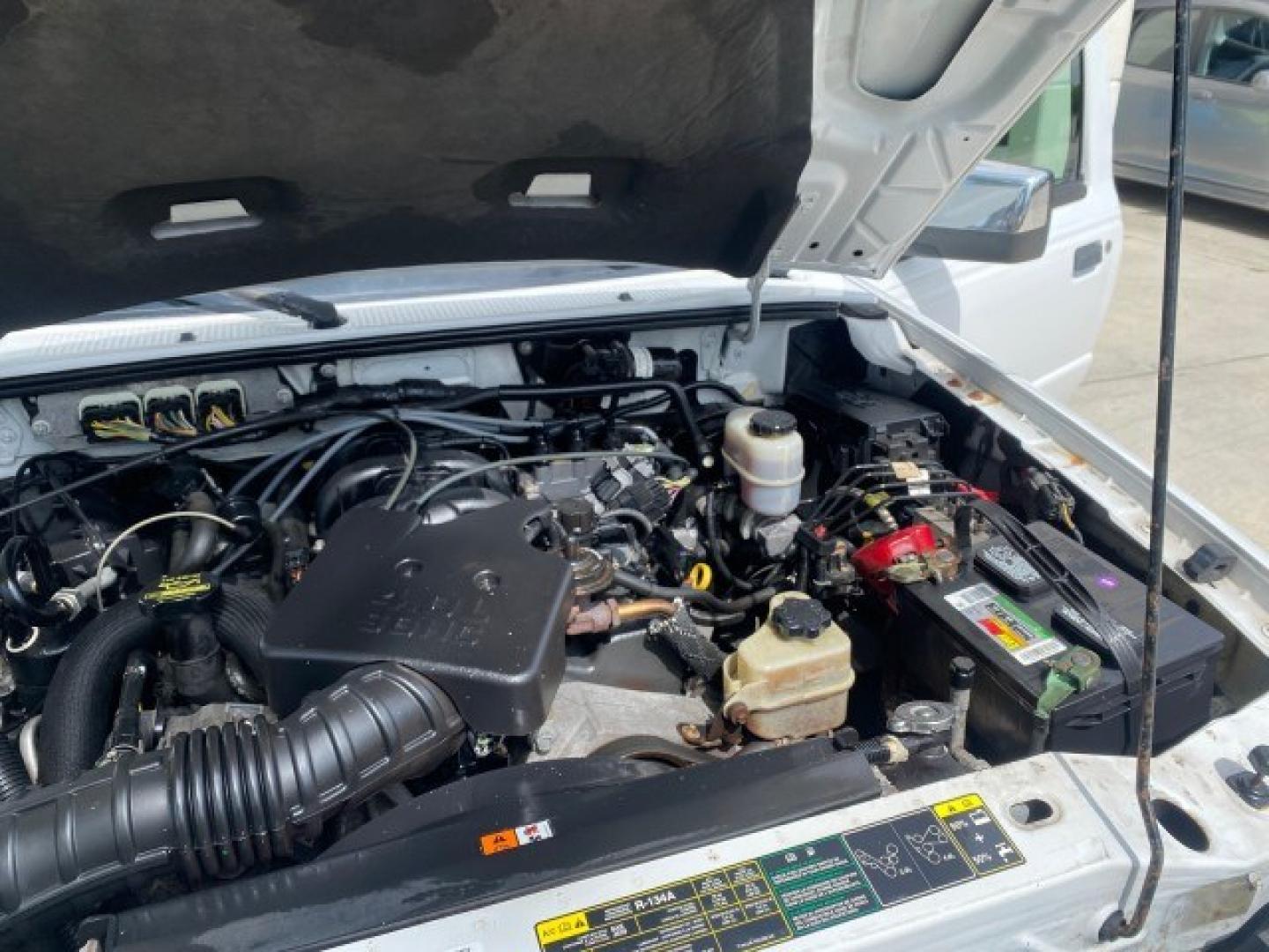 2011 Oxford White /Medium Dark Flint Ford Ranger X CAB XLT 1 OWNER FL (1FTKR1EE7BP) with an 4.0L SOHC V6 Engine engine, Automatic transmission, located at 4701 North Dixie Hwy, Pompano Beach, FL, 33064, (954) 422-2889, 26.240938, -80.123474 - OUR WEBPAGE FLORIDACARS1.COM HAS OVER 100 PHOTOS AND FREE CARFAX LINK 2011 Ford Ranger XLT 1 OWNER Club Cab Pickup 4.0L V6 F SOHC 16V Gasoline 21 MPG Rear Wheel Drive Features ABS Brakes Air Conditioning Alloy Wheels AM/FM Stereo Automatic Transmission Auxiliary Audio Input Bed Liner CD Audio Cloth- Photo#25