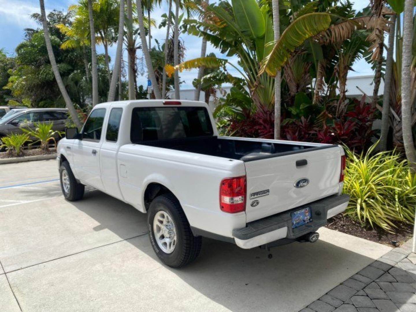 2011 Oxford White /Medium Dark Flint Ford Ranger X CAB XLT 1 OWNER FL (1FTKR1EE7BP) with an 4.0L SOHC V6 Engine engine, Automatic transmission, located at 4701 North Dixie Hwy, Pompano Beach, FL, 33064, (954) 422-2889, 26.240938, -80.123474 - OUR WEBPAGE FLORIDACARS1.COM HAS OVER 100 PHOTOS AND FREE CARFAX LINK 2011 Ford Ranger XLT 1 OWNER Club Cab Pickup 4.0L V6 F SOHC 16V Gasoline 21 MPG Rear Wheel Drive Features ABS Brakes Air Conditioning Alloy Wheels AM/FM Stereo Automatic Transmission Auxiliary Audio Input Bed Liner CD Audio Cloth- Photo#32