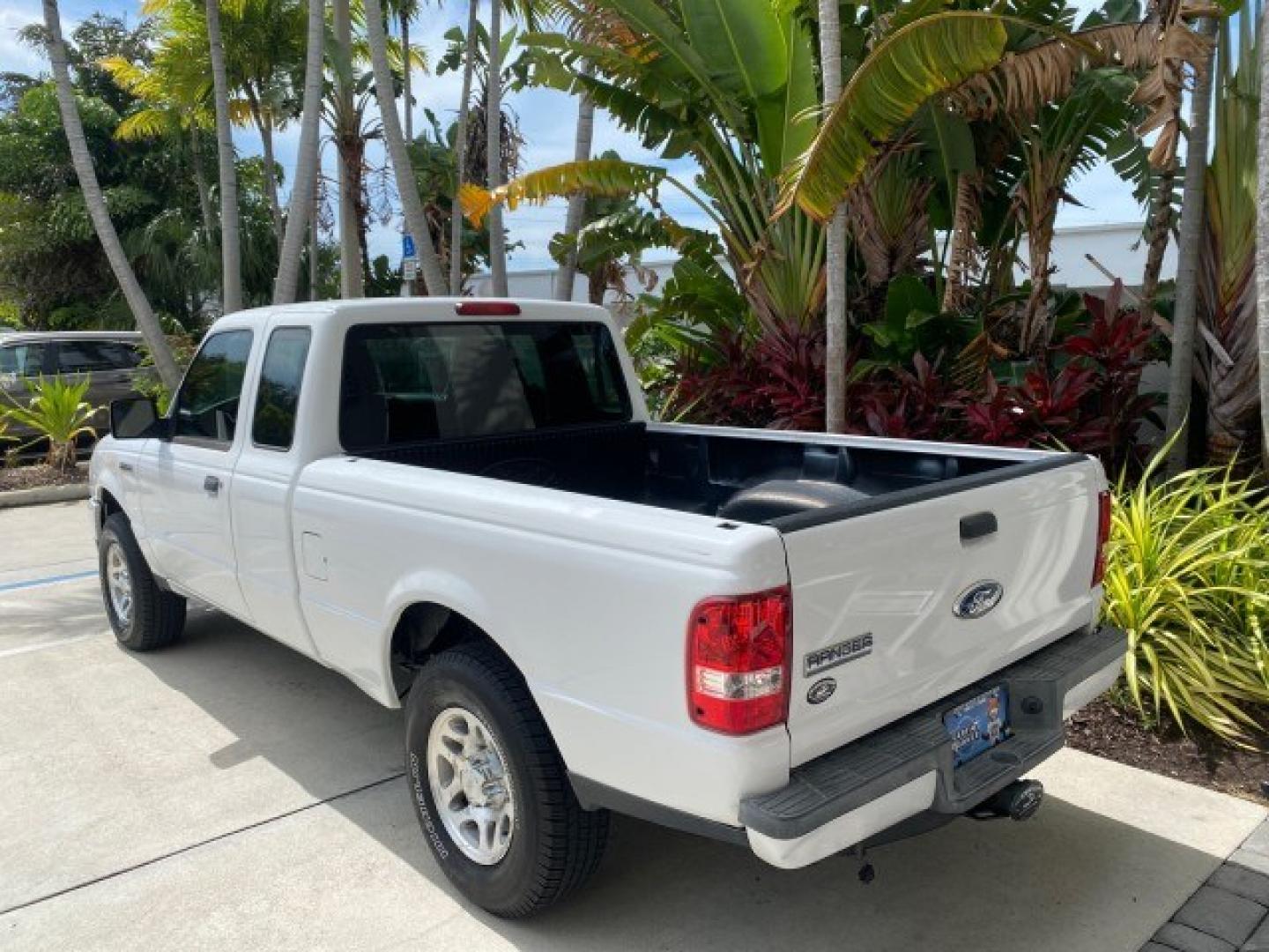 2011 Oxford White /Medium Dark Flint Ford Ranger X CAB XLT 1 OWNER FL (1FTKR1EE7BP) with an 4.0L SOHC V6 Engine engine, Automatic transmission, located at 4701 North Dixie Hwy, Pompano Beach, FL, 33064, (954) 422-2889, 26.240938, -80.123474 - OUR WEBPAGE FLORIDACARS1.COM HAS OVER 100 PHOTOS AND FREE CARFAX LINK 2011 Ford Ranger XLT 1 OWNER Club Cab Pickup 4.0L V6 F SOHC 16V Gasoline 21 MPG Rear Wheel Drive Features ABS Brakes Air Conditioning Alloy Wheels AM/FM Stereo Automatic Transmission Auxiliary Audio Input Bed Liner CD Audio Cloth- Photo#33