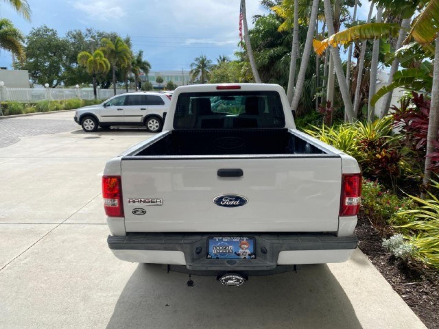 2011 Oxford White /Medium Dark Flint Ford Ranger X CAB XLT 1 OWNER FL (1FTKR1EE7BP) with an 4.0L SOHC V6 Engine engine, Automatic transmission, located at 4701 North Dixie Hwy, Pompano Beach, FL, 33064, (954) 422-2889, 26.240938, -80.123474 - OUR WEBPAGE FLORIDACARS1.COM HAS OVER 100 PHOTOS AND FREE CARFAX LINK 2011 Ford Ranger XLT 1 OWNER Club Cab Pickup 4.0L V6 F SOHC 16V Gasoline 21 MPG Rear Wheel Drive Features ABS Brakes Air Conditioning Alloy Wheels AM/FM Stereo Automatic Transmission Auxiliary Audio Input Bed Liner CD Audio Cloth- Photo#34
