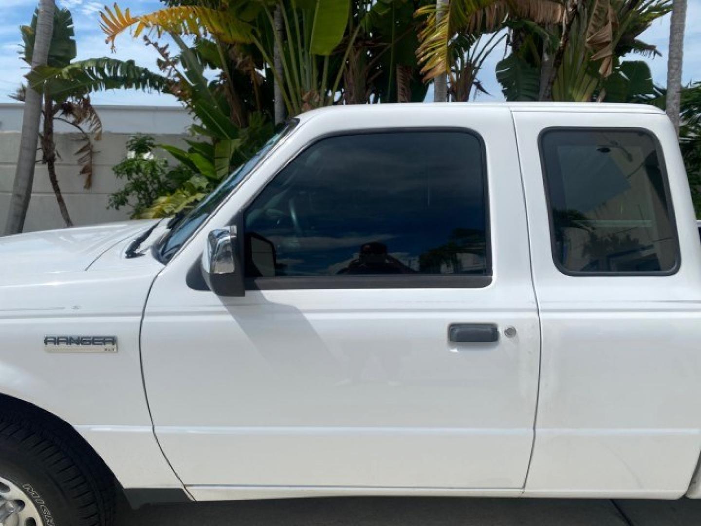 2011 Oxford White /Medium Dark Flint Ford Ranger X CAB XLT 1 OWNER FL (1FTKR1EE7BP) with an 4.0L SOHC V6 Engine engine, Automatic transmission, located at 4701 North Dixie Hwy, Pompano Beach, FL, 33064, (954) 422-2889, 26.240938, -80.123474 - OUR WEBPAGE FLORIDACARS1.COM HAS OVER 100 PHOTOS AND FREE CARFAX LINK 2011 Ford Ranger XLT 1 OWNER Club Cab Pickup 4.0L V6 F SOHC 16V Gasoline 21 MPG Rear Wheel Drive Features ABS Brakes Air Conditioning Alloy Wheels AM/FM Stereo Automatic Transmission Auxiliary Audio Input Bed Liner CD Audio Cloth- Photo#37