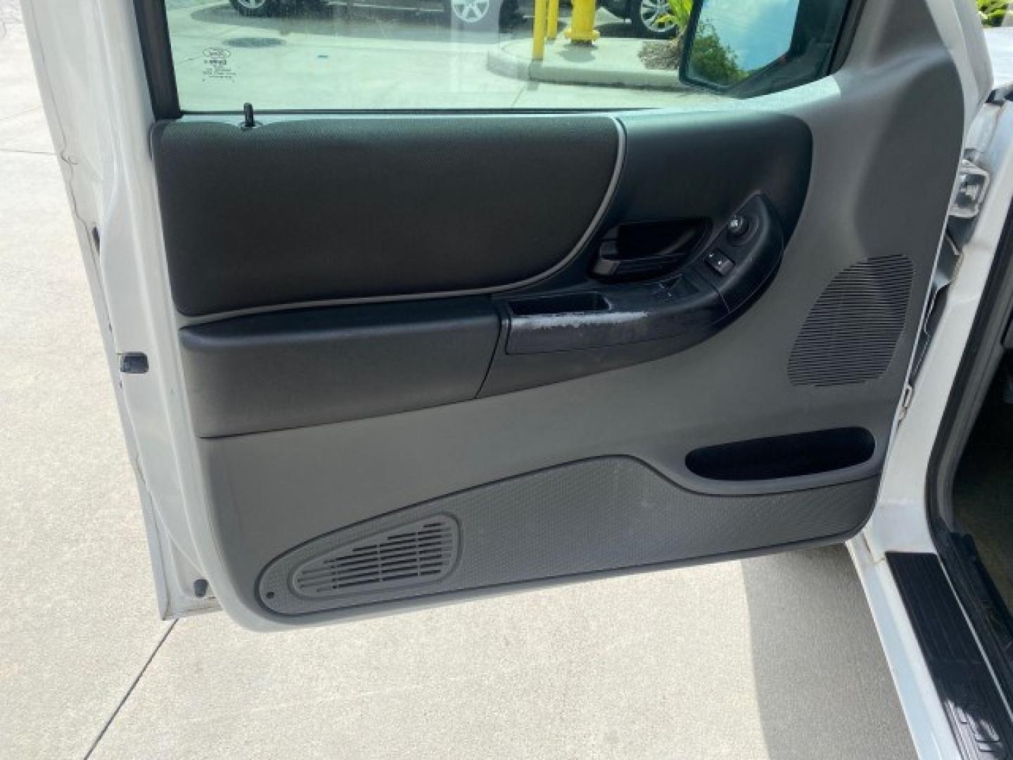 2011 Oxford White /Medium Dark Flint Ford Ranger X CAB XLT 1 OWNER FL (1FTKR1EE7BP) with an 4.0L SOHC V6 Engine engine, Automatic transmission, located at 4701 North Dixie Hwy, Pompano Beach, FL, 33064, (954) 422-2889, 26.240938, -80.123474 - OUR WEBPAGE FLORIDACARS1.COM HAS OVER 100 PHOTOS AND FREE CARFAX LINK 2011 Ford Ranger XLT 1 OWNER Club Cab Pickup 4.0L V6 F SOHC 16V Gasoline 21 MPG Rear Wheel Drive Features ABS Brakes Air Conditioning Alloy Wheels AM/FM Stereo Automatic Transmission Auxiliary Audio Input Bed Liner CD Audio Cloth- Photo#42