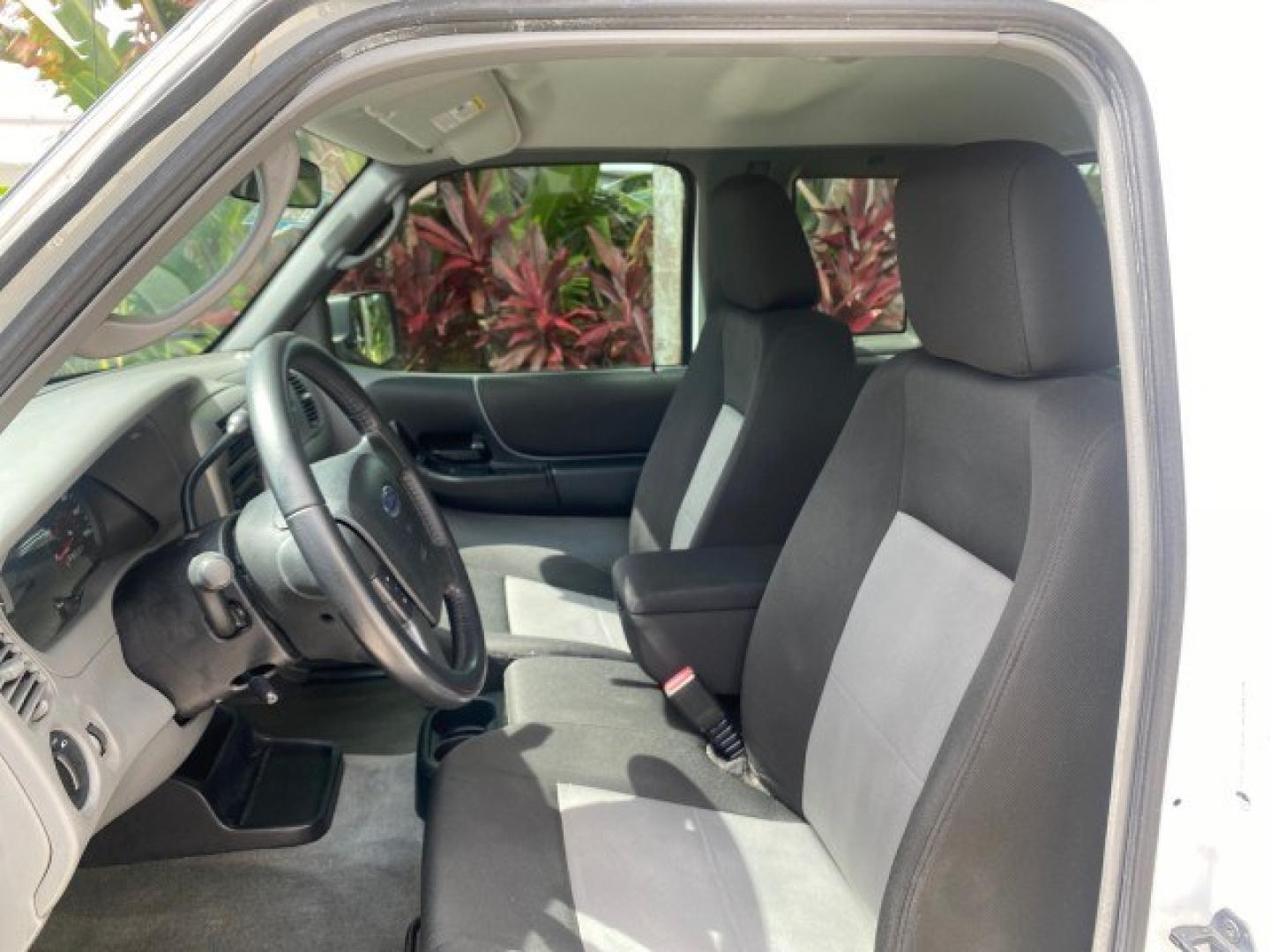 2011 Oxford White /Medium Dark Flint Ford Ranger X CAB XLT 1 OWNER FL (1FTKR1EE7BP) with an 4.0L SOHC V6 Engine engine, Automatic transmission, located at 4701 North Dixie Hwy, Pompano Beach, FL, 33064, (954) 422-2889, 26.240938, -80.123474 - OUR WEBPAGE FLORIDACARS1.COM HAS OVER 100 PHOTOS AND FREE CARFAX LINK 2011 Ford Ranger XLT 1 OWNER Club Cab Pickup 4.0L V6 F SOHC 16V Gasoline 21 MPG Rear Wheel Drive Features ABS Brakes Air Conditioning Alloy Wheels AM/FM Stereo Automatic Transmission Auxiliary Audio Input Bed Liner CD Audio Cloth- Photo#44