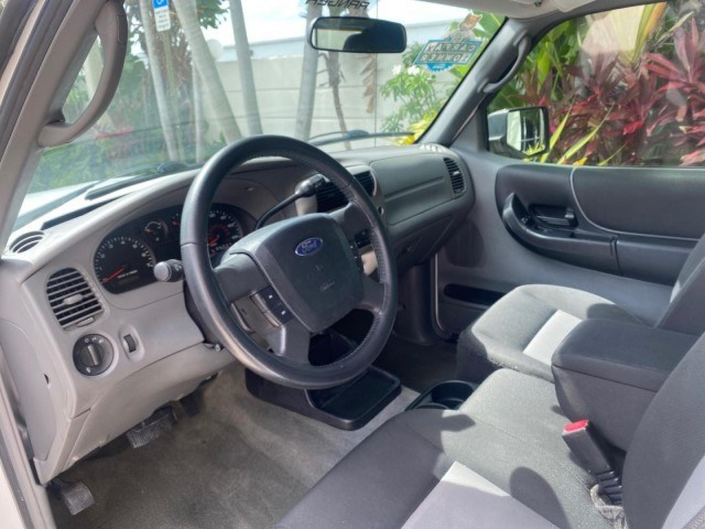 2011 Oxford White /Medium Dark Flint Ford Ranger X CAB XLT 1 OWNER FL (1FTKR1EE7BP) with an 4.0L SOHC V6 Engine engine, Automatic transmission, located at 4701 North Dixie Hwy, Pompano Beach, FL, 33064, (954) 422-2889, 26.240938, -80.123474 - OUR WEBPAGE FLORIDACARS1.COM HAS OVER 100 PHOTOS AND FREE CARFAX LINK 2011 Ford Ranger XLT 1 OWNER Club Cab Pickup 4.0L V6 F SOHC 16V Gasoline 21 MPG Rear Wheel Drive Features ABS Brakes Air Conditioning Alloy Wheels AM/FM Stereo Automatic Transmission Auxiliary Audio Input Bed Liner CD Audio Cloth- Photo#47