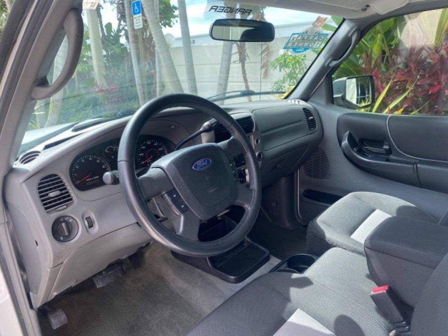 2011 Oxford White /Medium Dark Flint Ford Ranger X CAB XLT 1 OWNER FL (1FTKR1EE7BP) with an 4.0L SOHC V6 Engine engine, Automatic transmission, located at 4701 North Dixie Hwy, Pompano Beach, FL, 33064, (954) 422-2889, 26.240938, -80.123474 - OUR WEBPAGE FLORIDACARS1.COM HAS OVER 100 PHOTOS AND FREE CARFAX LINK 2011 Ford Ranger XLT 1 OWNER Club Cab Pickup 4.0L V6 F SOHC 16V Gasoline 21 MPG Rear Wheel Drive Features ABS Brakes Air Conditioning Alloy Wheels AM/FM Stereo Automatic Transmission Auxiliary Audio Input Bed Liner CD Audio Cloth- Photo#48