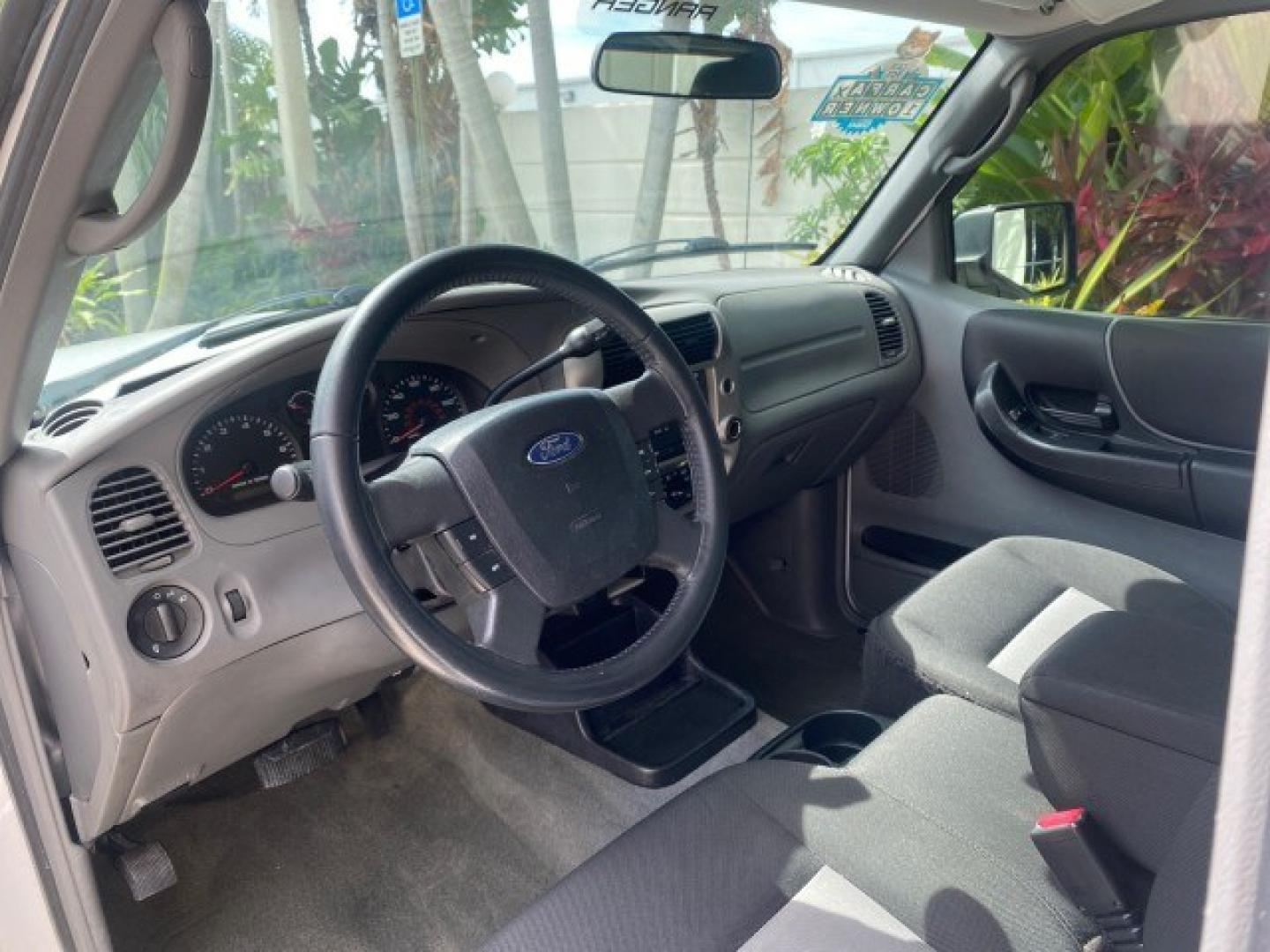 2011 Oxford White /Medium Dark Flint Ford Ranger X CAB XLT 1 OWNER FL (1FTKR1EE7BP) with an 4.0L SOHC V6 Engine engine, Automatic transmission, located at 4701 North Dixie Hwy, Pompano Beach, FL, 33064, (954) 422-2889, 26.240938, -80.123474 - OUR WEBPAGE FLORIDACARS1.COM HAS OVER 100 PHOTOS AND FREE CARFAX LINK 2011 Ford Ranger XLT 1 OWNER Club Cab Pickup 4.0L V6 F SOHC 16V Gasoline 21 MPG Rear Wheel Drive Features ABS Brakes Air Conditioning Alloy Wheels AM/FM Stereo Automatic Transmission Auxiliary Audio Input Bed Liner CD Audio Cloth- Photo#49