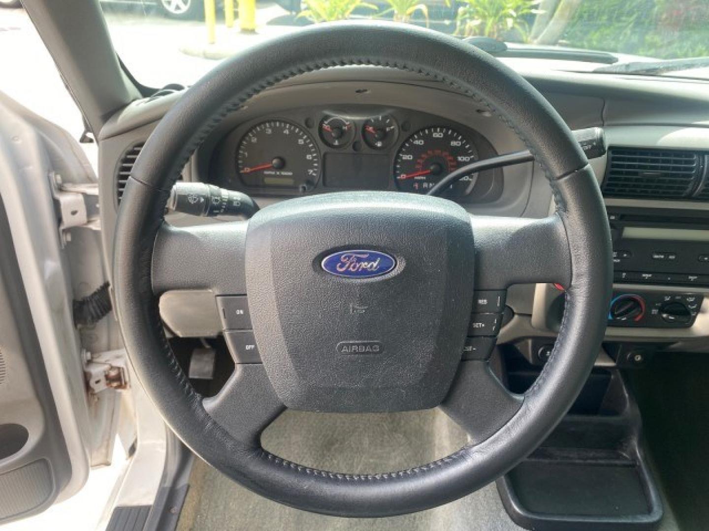 2011 Oxford White /Medium Dark Flint Ford Ranger X CAB XLT 1 OWNER FL (1FTKR1EE7BP) with an 4.0L SOHC V6 Engine engine, Automatic transmission, located at 4701 North Dixie Hwy, Pompano Beach, FL, 33064, (954) 422-2889, 26.240938, -80.123474 - OUR WEBPAGE FLORIDACARS1.COM HAS OVER 100 PHOTOS AND FREE CARFAX LINK 2011 Ford Ranger XLT 1 OWNER Club Cab Pickup 4.0L V6 F SOHC 16V Gasoline 21 MPG Rear Wheel Drive Features ABS Brakes Air Conditioning Alloy Wheels AM/FM Stereo Automatic Transmission Auxiliary Audio Input Bed Liner CD Audio Cloth- Photo#50