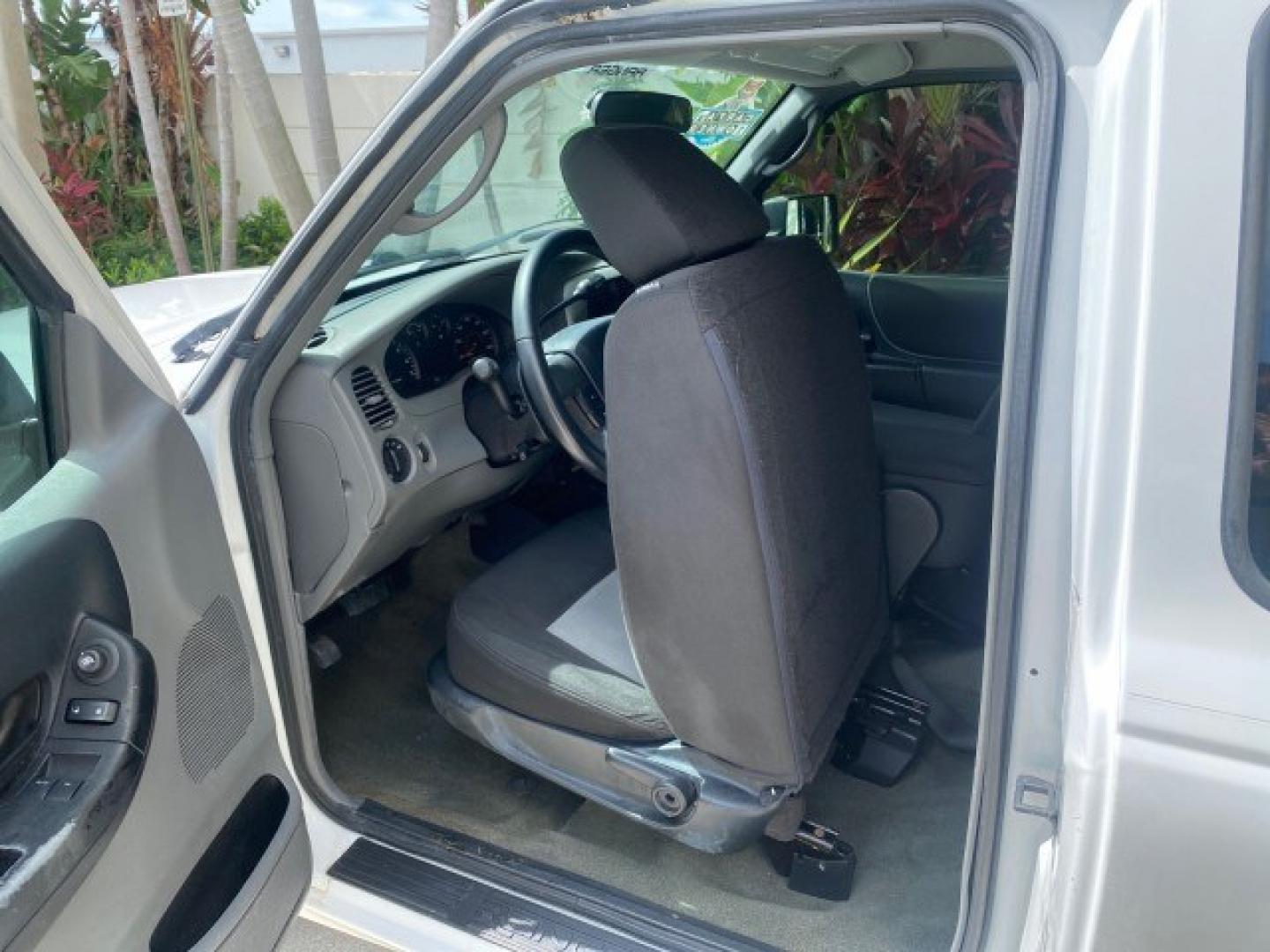 2011 Oxford White /Medium Dark Flint Ford Ranger X CAB XLT 1 OWNER FL (1FTKR1EE7BP) with an 4.0L SOHC V6 Engine engine, Automatic transmission, located at 4701 North Dixie Hwy, Pompano Beach, FL, 33064, (954) 422-2889, 26.240938, -80.123474 - OUR WEBPAGE FLORIDACARS1.COM HAS OVER 100 PHOTOS AND FREE CARFAX LINK 2011 Ford Ranger XLT 1 OWNER Club Cab Pickup 4.0L V6 F SOHC 16V Gasoline 21 MPG Rear Wheel Drive Features ABS Brakes Air Conditioning Alloy Wheels AM/FM Stereo Automatic Transmission Auxiliary Audio Input Bed Liner CD Audio Cloth- Photo#75