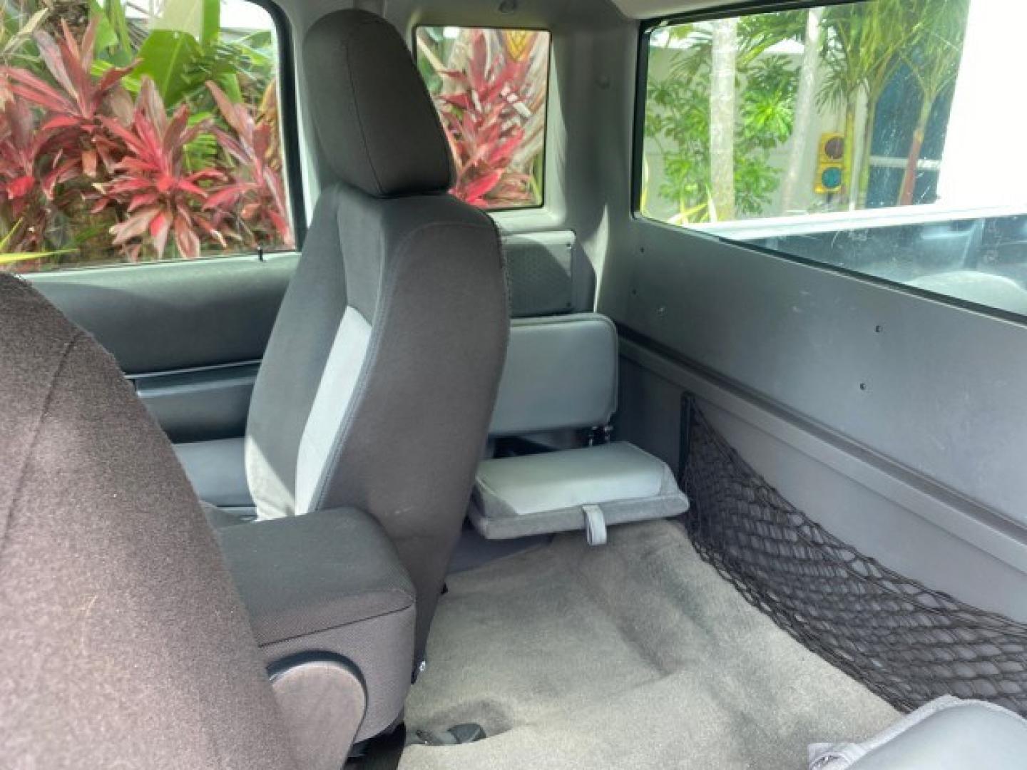 2011 Oxford White /Medium Dark Flint Ford Ranger X CAB XLT 1 OWNER FL (1FTKR1EE7BP) with an 4.0L SOHC V6 Engine engine, Automatic transmission, located at 4701 North Dixie Hwy, Pompano Beach, FL, 33064, (954) 422-2889, 26.240938, -80.123474 - OUR WEBPAGE FLORIDACARS1.COM HAS OVER 100 PHOTOS AND FREE CARFAX LINK 2011 Ford Ranger XLT 1 OWNER Club Cab Pickup 4.0L V6 F SOHC 16V Gasoline 21 MPG Rear Wheel Drive Features ABS Brakes Air Conditioning Alloy Wheels AM/FM Stereo Automatic Transmission Auxiliary Audio Input Bed Liner CD Audio Cloth- Photo#76