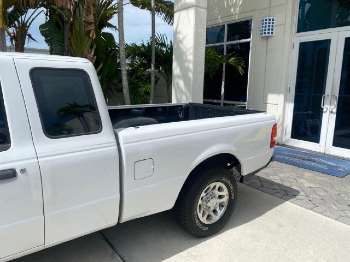 2011 Oxford White /Medium Dark Flint Ford Ranger X CAB XLT 1 OWNER FL (1FTKR1EE7BP) with an 4.0L SOHC V6 Engine engine, Automatic transmission, located at 4701 North Dixie Hwy, Pompano Beach, FL, 33064, (954) 422-2889, 26.240938, -80.123474 - OUR WEBPAGE FLORIDACARS1.COM HAS OVER 100 PHOTOS AND FREE CARFAX LINK 2011 Ford Ranger XLT 1 OWNER Club Cab Pickup 4.0L V6 F SOHC 16V Gasoline 21 MPG Rear Wheel Drive Features ABS Brakes Air Conditioning Alloy Wheels AM/FM Stereo Automatic Transmission Auxiliary Audio Input Bed Liner CD Audio Cloth- Photo#83