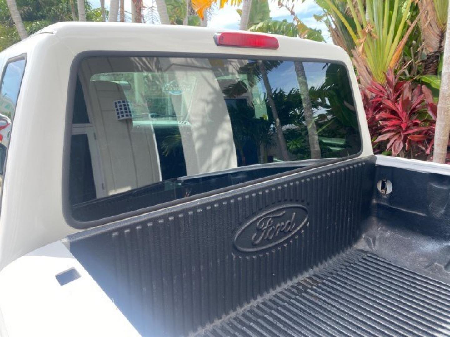2011 Oxford White /Medium Dark Flint Ford Ranger X CAB XLT 1 OWNER FL (1FTKR1EE7BP) with an 4.0L SOHC V6 Engine engine, Automatic transmission, located at 4701 North Dixie Hwy, Pompano Beach, FL, 33064, (954) 422-2889, 26.240938, -80.123474 - OUR WEBPAGE FLORIDACARS1.COM HAS OVER 100 PHOTOS AND FREE CARFAX LINK 2011 Ford Ranger XLT 1 OWNER Club Cab Pickup 4.0L V6 F SOHC 16V Gasoline 21 MPG Rear Wheel Drive Features ABS Brakes Air Conditioning Alloy Wheels AM/FM Stereo Automatic Transmission Auxiliary Audio Input Bed Liner CD Audio Cloth- Photo#92