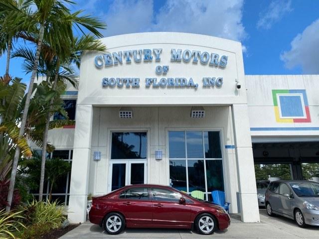 2010 Tango Red Pearl /Black Honda Civic Sdn LX-S LOW MILES 18,946 1 OWNER (2HGFA1F64AH) with an 1.8L SOHC MPFI 16-Valve i-VTEC I4 Engine engine, Automatic transmission, located at 4701 North Dixie Hwy, Pompano Beach, FL, 33064, (954) 422-2889, 26.240938, -80.123474 - OUR WEBPAGE FLORIDACARS1.COM HAS OVER 100 PHOTOS AND FREE CARFAX LINK 2010 Honda Civic LX-S 1 OWNER Sedan 4 DR 1.8L I4 F SOHC 16V Gasoline 36 MPG Front Wheel Drive Features ABS Brakes Air Conditioning Alloy Wheels AM/FM Stereo Automatic Transmission Auxiliary Audio Input CD Audio Cloth Seats Cruise- Photo#0