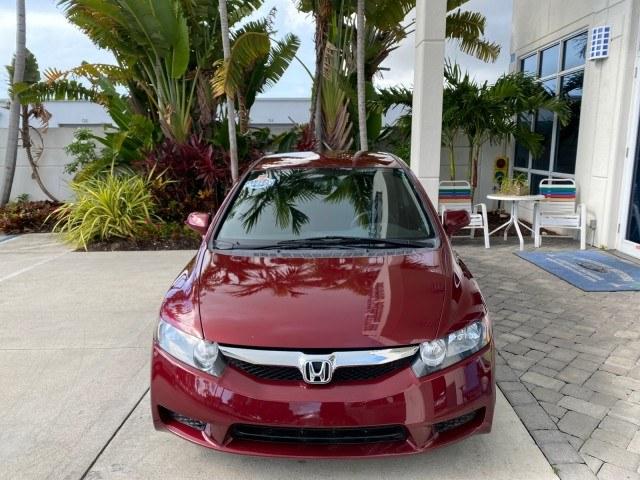 2010 Tango Red Pearl /Black Honda Civic Sdn LX-S LOW MILES 18,946 1 OWNER (2HGFA1F64AH) with an 1.8L SOHC MPFI 16-Valve i-VTEC I4 Engine engine, Automatic transmission, located at 4701 North Dixie Hwy, Pompano Beach, FL, 33064, (954) 422-2889, 26.240938, -80.123474 - OUR WEBPAGE FLORIDACARS1.COM HAS OVER 100 PHOTOS AND FREE CARFAX LINK 2010 Honda Civic LX-S 1 OWNER Sedan 4 DR 1.8L I4 F SOHC 16V Gasoline 36 MPG Front Wheel Drive Features ABS Brakes Air Conditioning Alloy Wheels AM/FM Stereo Automatic Transmission Auxiliary Audio Input CD Audio Cloth Seats Cruise- Photo#2