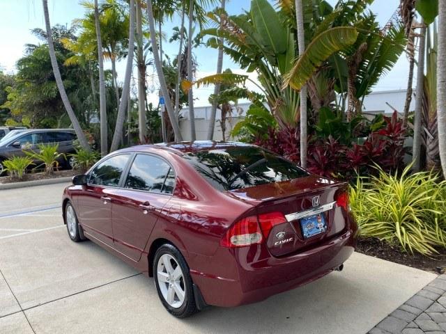 2010 Tango Red Pearl /Black Honda Civic Sdn LX-S LOW MILES 18,946 1 OWNER (2HGFA1F64AH) with an 1.8L SOHC MPFI 16-Valve i-VTEC I4 Engine engine, Automatic transmission, located at 4701 North Dixie Hwy, Pompano Beach, FL, 33064, (954) 422-2889, 26.240938, -80.123474 - OUR WEBPAGE FLORIDACARS1.COM HAS OVER 100 PHOTOS AND FREE CARFAX LINK 2010 Honda Civic LX-S 1 OWNER Sedan 4 DR 1.8L I4 F SOHC 16V Gasoline 36 MPG Front Wheel Drive Features ABS Brakes Air Conditioning Alloy Wheels AM/FM Stereo Automatic Transmission Auxiliary Audio Input CD Audio Cloth Seats Cruise- Photo#5