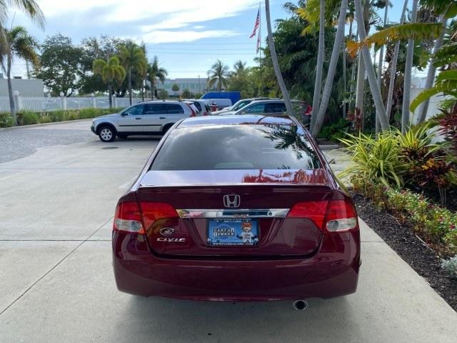 2010 Tango Red Pearl /Black Honda Civic Sdn LX-S LOW MILES 18,946 1 OWNER (2HGFA1F64AH) with an 1.8L SOHC MPFI 16-Valve i-VTEC I4 Engine engine, Automatic transmission, located at 4701 North Dixie Hwy, Pompano Beach, FL, 33064, (954) 422-2889, 26.240938, -80.123474 - OUR WEBPAGE FLORIDACARS1.COM HAS OVER 100 PHOTOS AND FREE CARFAX LINK 2010 Honda Civic LX-S 1 OWNER Sedan 4 DR 1.8L I4 F SOHC 16V Gasoline 36 MPG Front Wheel Drive Features ABS Brakes Air Conditioning Alloy Wheels AM/FM Stereo Automatic Transmission Auxiliary Audio Input CD Audio Cloth Seats Cruise- Photo#6