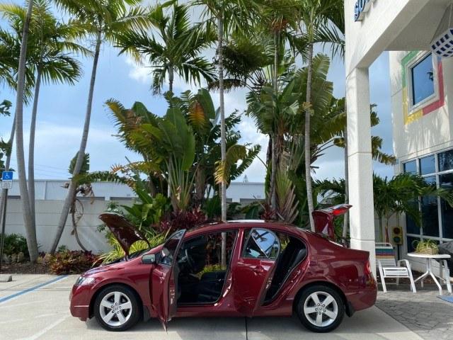 2010 Tango Red Pearl /Black Honda Civic Sdn LX-S LOW MILES 18,946 1 OWNER (2HGFA1F64AH) with an 1.8L SOHC MPFI 16-Valve i-VTEC I4 Engine engine, Automatic transmission, located at 4701 North Dixie Hwy, Pompano Beach, FL, 33064, (954) 422-2889, 26.240938, -80.123474 - OUR WEBPAGE FLORIDACARS1.COM HAS OVER 100 PHOTOS AND FREE CARFAX LINK 2010 Honda Civic LX-S 1 OWNER Sedan 4 DR 1.8L I4 F SOHC 16V Gasoline 36 MPG Front Wheel Drive Features ABS Brakes Air Conditioning Alloy Wheels AM/FM Stereo Automatic Transmission Auxiliary Audio Input CD Audio Cloth Seats Cruise- Photo#8