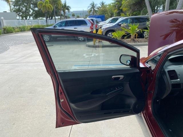 2010 Tango Red Pearl /Black Honda Civic Sdn LX-S LOW MILES 18,946 1 OWNER (2HGFA1F64AH) with an 1.8L SOHC MPFI 16-Valve i-VTEC I4 Engine engine, Automatic transmission, located at 4701 North Dixie Hwy, Pompano Beach, FL, 33064, (954) 422-2889, 26.240938, -80.123474 - OUR WEBPAGE FLORIDACARS1.COM HAS OVER 100 PHOTOS AND FREE CARFAX LINK 2010 Honda Civic LX-S 1 OWNER Sedan 4 DR 1.8L I4 F SOHC 16V Gasoline 36 MPG Front Wheel Drive Features ABS Brakes Air Conditioning Alloy Wheels AM/FM Stereo Automatic Transmission Auxiliary Audio Input CD Audio Cloth Seats Cruise- Photo#9
