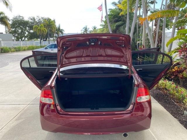 2010 Tango Red Pearl /Black Honda Civic Sdn LX-S LOW MILES 18,946 1 OWNER (2HGFA1F64AH) with an 1.8L SOHC MPFI 16-Valve i-VTEC I4 Engine engine, Automatic transmission, located at 4701 North Dixie Hwy, Pompano Beach, FL, 33064, (954) 422-2889, 26.240938, -80.123474 - OUR WEBPAGE FLORIDACARS1.COM HAS OVER 100 PHOTOS AND FREE CARFAX LINK 2010 Honda Civic LX-S 1 OWNER Sedan 4 DR 1.8L I4 F SOHC 16V Gasoline 36 MPG Front Wheel Drive Features ABS Brakes Air Conditioning Alloy Wheels AM/FM Stereo Automatic Transmission Auxiliary Audio Input CD Audio Cloth Seats Cruise- Photo#15