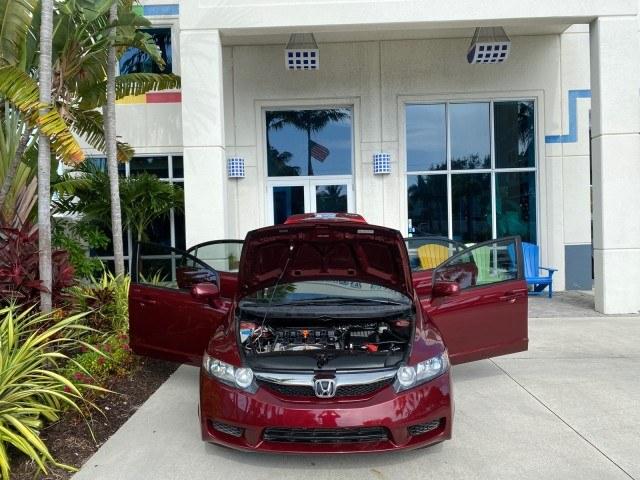 2010 Tango Red Pearl /Black Honda Civic Sdn LX-S LOW MILES 18,946 1 OWNER (2HGFA1F64AH) with an 1.8L SOHC MPFI 16-Valve i-VTEC I4 Engine engine, Automatic transmission, located at 4701 North Dixie Hwy, Pompano Beach, FL, 33064, (954) 422-2889, 26.240938, -80.123474 - OUR WEBPAGE FLORIDACARS1.COM HAS OVER 100 PHOTOS AND FREE CARFAX LINK 2010 Honda Civic LX-S 1 OWNER Sedan 4 DR 1.8L I4 F SOHC 16V Gasoline 36 MPG Front Wheel Drive Features ABS Brakes Air Conditioning Alloy Wheels AM/FM Stereo Automatic Transmission Auxiliary Audio Input CD Audio Cloth Seats Cruise- Photo#16