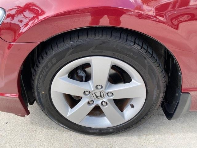 2010 Tango Red Pearl /Black Honda Civic Sdn LX-S LOW MILES 18,946 1 OWNER (2HGFA1F64AH) with an 1.8L SOHC MPFI 16-Valve i-VTEC I4 Engine engine, Automatic transmission, located at 4701 North Dixie Hwy, Pompano Beach, FL, 33064, (954) 422-2889, 26.240938, -80.123474 - OUR WEBPAGE FLORIDACARS1.COM HAS OVER 100 PHOTOS AND FREE CARFAX LINK 2010 Honda Civic LX-S 1 OWNER Sedan 4 DR 1.8L I4 F SOHC 16V Gasoline 36 MPG Front Wheel Drive Features ABS Brakes Air Conditioning Alloy Wheels AM/FM Stereo Automatic Transmission Auxiliary Audio Input CD Audio Cloth Seats Cruise- Photo#19