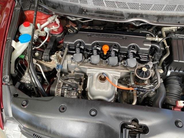 2010 Tango Red Pearl /Black Honda Civic Sdn LX-S LOW MILES 18,946 1 OWNER (2HGFA1F64AH) with an 1.8L SOHC MPFI 16-Valve i-VTEC I4 Engine engine, Automatic transmission, located at 4701 North Dixie Hwy, Pompano Beach, FL, 33064, (954) 422-2889, 26.240938, -80.123474 - OUR WEBPAGE FLORIDACARS1.COM HAS OVER 100 PHOTOS AND FREE CARFAX LINK 2010 Honda Civic LX-S 1 OWNER Sedan 4 DR 1.8L I4 F SOHC 16V Gasoline 36 MPG Front Wheel Drive Features ABS Brakes Air Conditioning Alloy Wheels AM/FM Stereo Automatic Transmission Auxiliary Audio Input CD Audio Cloth Seats Cruise- Photo#24