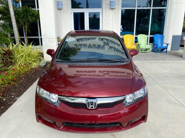 2010 Tango Red Pearl /Black Honda Civic Sdn LX-S LOW MILES 18,946 1 OWNER (2HGFA1F64AH) with an 1.8L SOHC MPFI 16-Valve i-VTEC I4 Engine engine, Automatic transmission, located at 4701 North Dixie Hwy, Pompano Beach, FL, 33064, (954) 422-2889, 26.240938, -80.123474 - OUR WEBPAGE FLORIDACARS1.COM HAS OVER 100 PHOTOS AND FREE CARFAX LINK 2010 Honda Civic LX-S 1 OWNER Sedan 4 DR 1.8L I4 F SOHC 16V Gasoline 36 MPG Front Wheel Drive Features ABS Brakes Air Conditioning Alloy Wheels AM/FM Stereo Automatic Transmission Auxiliary Audio Input CD Audio Cloth Seats Cruise- Photo#27