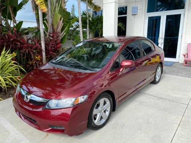 2010 Tango Red Pearl /Black Honda Civic Sdn LX-S LOW MILES 18,946 1 OWNER (2HGFA1F64AH) with an 1.8L SOHC MPFI 16-Valve i-VTEC I4 Engine engine, Automatic transmission, located at 4701 North Dixie Hwy, Pompano Beach, FL, 33064, (954) 422-2889, 26.240938, -80.123474 - OUR WEBPAGE FLORIDACARS1.COM HAS OVER 100 PHOTOS AND FREE CARFAX LINK 2010 Honda Civic LX-S 1 OWNER Sedan 4 DR 1.8L I4 F SOHC 16V Gasoline 36 MPG Front Wheel Drive Features ABS Brakes Air Conditioning Alloy Wheels AM/FM Stereo Automatic Transmission Auxiliary Audio Input CD Audio Cloth Seats Cruise- Photo#29