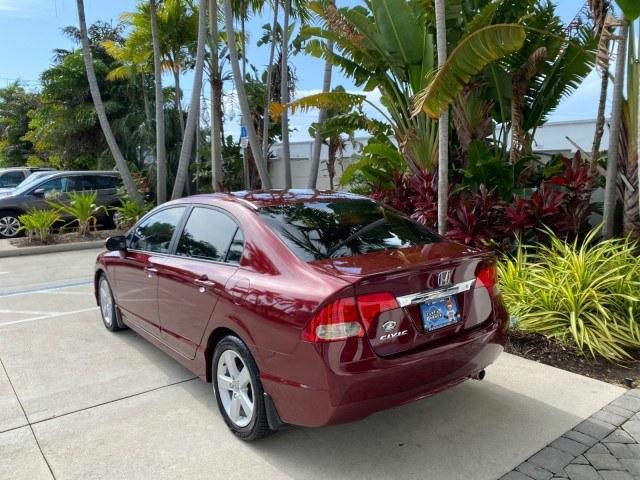 2010 Tango Red Pearl /Black Honda Civic Sdn LX-S LOW MILES 18,946 1 OWNER (2HGFA1F64AH) with an 1.8L SOHC MPFI 16-Valve i-VTEC I4 Engine engine, Automatic transmission, located at 4701 North Dixie Hwy, Pompano Beach, FL, 33064, (954) 422-2889, 26.240938, -80.123474 - OUR WEBPAGE FLORIDACARS1.COM HAS OVER 100 PHOTOS AND FREE CARFAX LINK 2010 Honda Civic LX-S 1 OWNER Sedan 4 DR 1.8L I4 F SOHC 16V Gasoline 36 MPG Front Wheel Drive Features ABS Brakes Air Conditioning Alloy Wheels AM/FM Stereo Automatic Transmission Auxiliary Audio Input CD Audio Cloth Seats Cruise- Photo#32