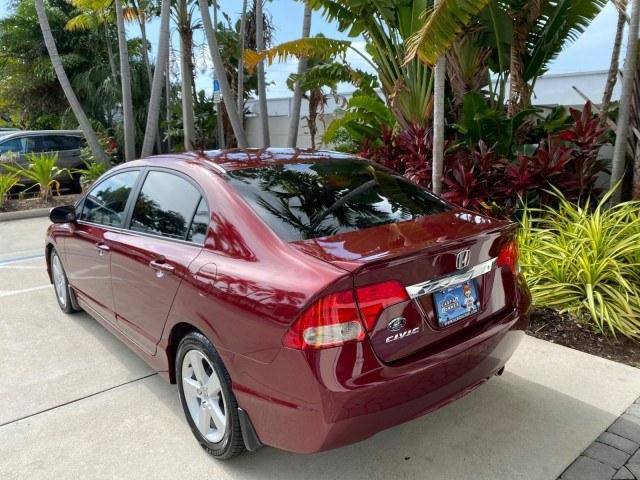 2010 Tango Red Pearl /Black Honda Civic Sdn LX-S LOW MILES 18,946 1 OWNER (2HGFA1F64AH) with an 1.8L SOHC MPFI 16-Valve i-VTEC I4 Engine engine, Automatic transmission, located at 4701 North Dixie Hwy, Pompano Beach, FL, 33064, (954) 422-2889, 26.240938, -80.123474 - OUR WEBPAGE FLORIDACARS1.COM HAS OVER 100 PHOTOS AND FREE CARFAX LINK 2010 Honda Civic LX-S 1 OWNER Sedan 4 DR 1.8L I4 F SOHC 16V Gasoline 36 MPG Front Wheel Drive Features ABS Brakes Air Conditioning Alloy Wheels AM/FM Stereo Automatic Transmission Auxiliary Audio Input CD Audio Cloth Seats Cruise- Photo#33