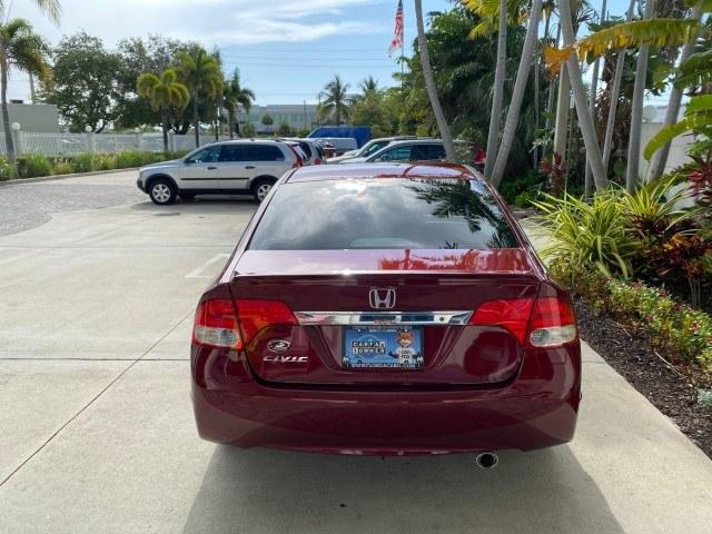 2010 Tango Red Pearl /Black Honda Civic Sdn LX-S LOW MILES 18,946 1 OWNER (2HGFA1F64AH) with an 1.8L SOHC MPFI 16-Valve i-VTEC I4 Engine engine, Automatic transmission, located at 4701 North Dixie Hwy, Pompano Beach, FL, 33064, (954) 422-2889, 26.240938, -80.123474 - OUR WEBPAGE FLORIDACARS1.COM HAS OVER 100 PHOTOS AND FREE CARFAX LINK 2010 Honda Civic LX-S 1 OWNER Sedan 4 DR 1.8L I4 F SOHC 16V Gasoline 36 MPG Front Wheel Drive Features ABS Brakes Air Conditioning Alloy Wheels AM/FM Stereo Automatic Transmission Auxiliary Audio Input CD Audio Cloth Seats Cruise- Photo#34