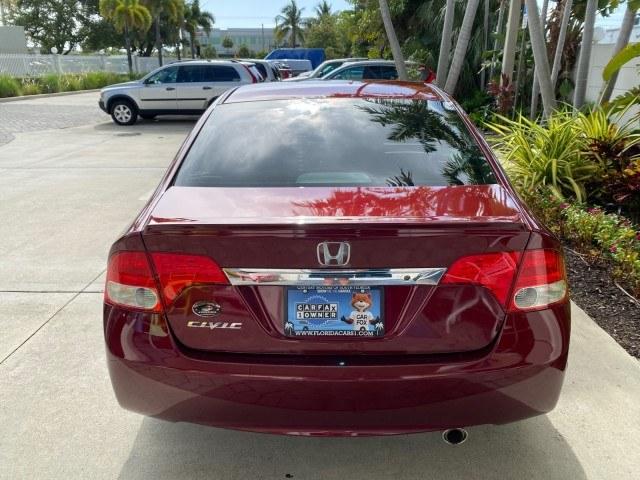 2010 Tango Red Pearl /Black Honda Civic Sdn LX-S LOW MILES 18,946 1 OWNER (2HGFA1F64AH) with an 1.8L SOHC MPFI 16-Valve i-VTEC I4 Engine engine, Automatic transmission, located at 4701 North Dixie Hwy, Pompano Beach, FL, 33064, (954) 422-2889, 26.240938, -80.123474 - OUR WEBPAGE FLORIDACARS1.COM HAS OVER 100 PHOTOS AND FREE CARFAX LINK 2010 Honda Civic LX-S 1 OWNER Sedan 4 DR 1.8L I4 F SOHC 16V Gasoline 36 MPG Front Wheel Drive Features ABS Brakes Air Conditioning Alloy Wheels AM/FM Stereo Automatic Transmission Auxiliary Audio Input CD Audio Cloth Seats Cruise- Photo#35